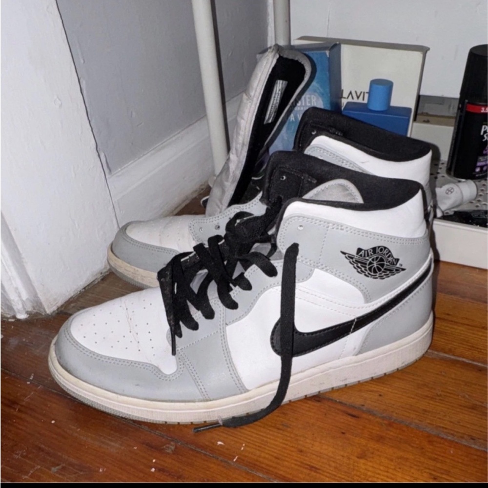 White and Gray High-Top Sneakers with Black Accents